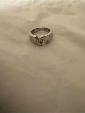 Polished Silver Solitaire Ring with Clear Center Stone